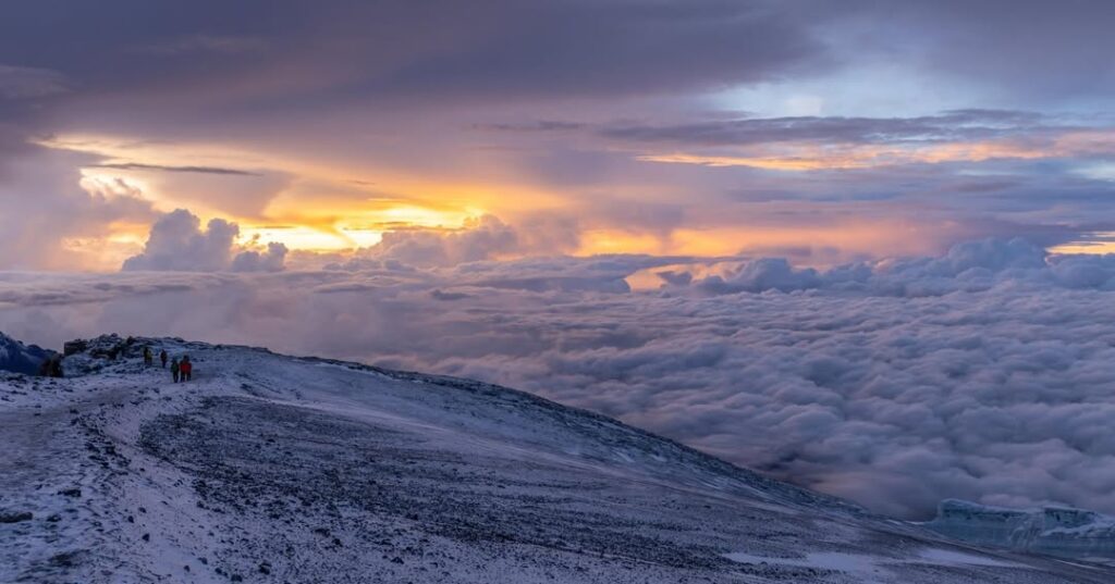 Kilimanjaro mountain rongai route snow clouds trekking